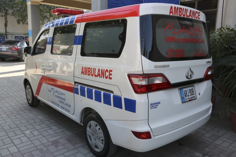 A white ambulance vehicle parked up outside the Capt. Muazzam Ali Saheed Welfare Hospital in Jhelum
