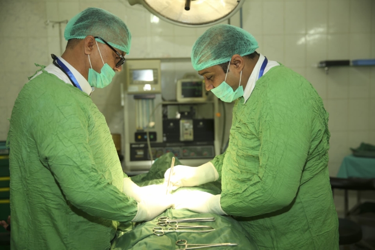 Surgeons performing an operation at muazzam hospital