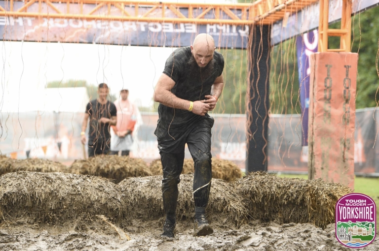 A man navigating tough mudder 2022 Yorkshire